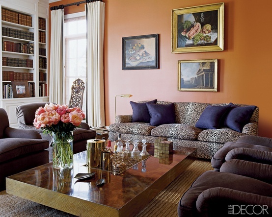 Orange walls with purple pillows