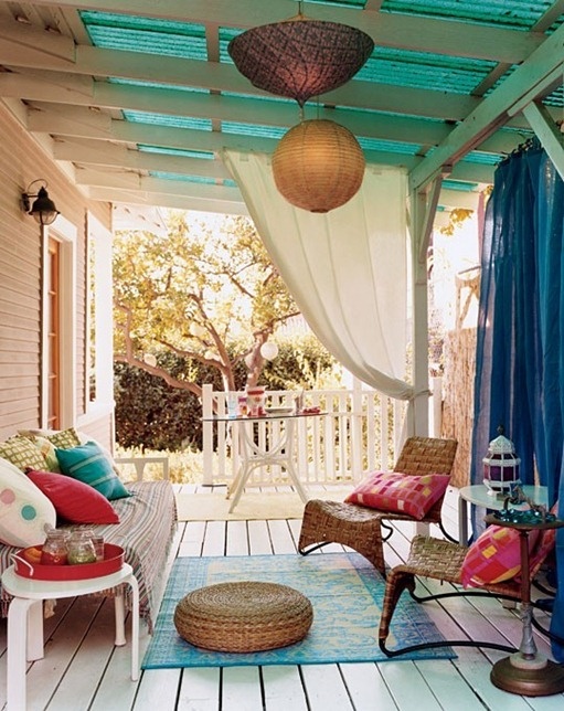 Porch with rug and pillows