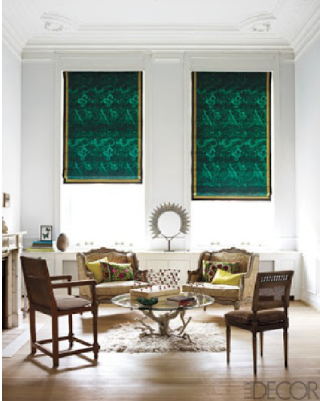 Living room with emerald green curtains