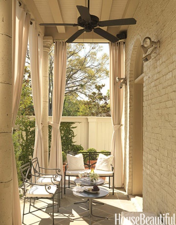 Neutral curtains on porch