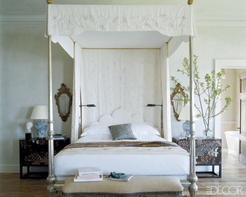 Canopy bed with embroidered fabric